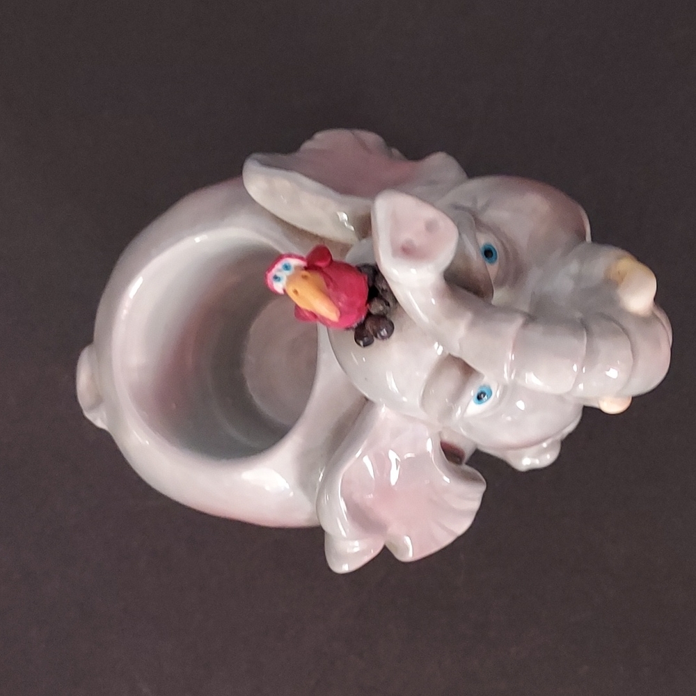 Elephant w/Cardinal on head Votive Holder sz. 5 3/4  inches Hx 6inches W. Multi.